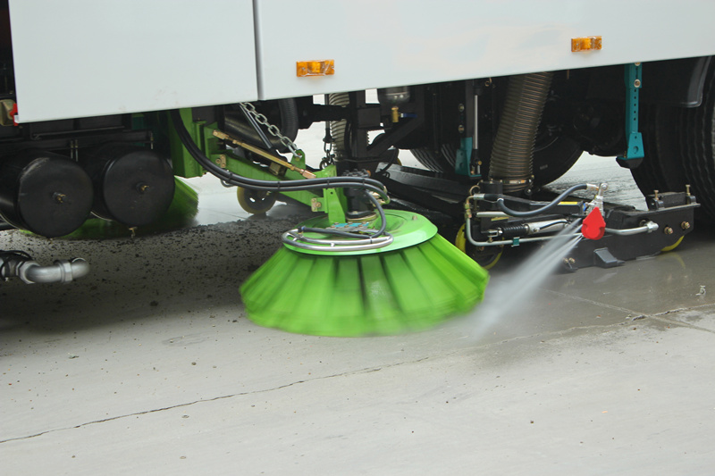 Sweeping and water jetting for road cleaning